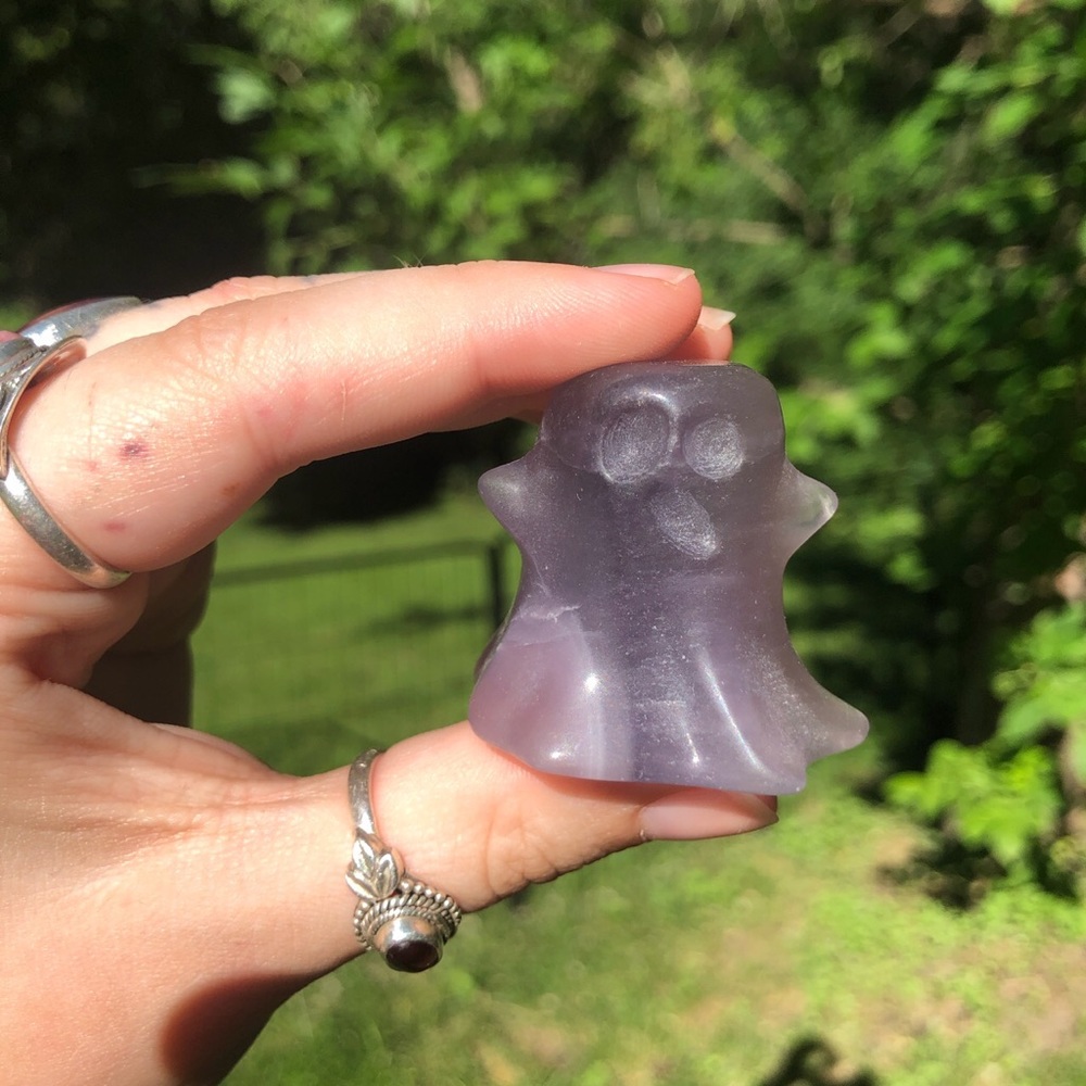 Purple fluorite ghost crystal carving